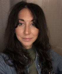 A portrait photograph of Laura Mackenzie, Communications Officer at Girls Not Brides.